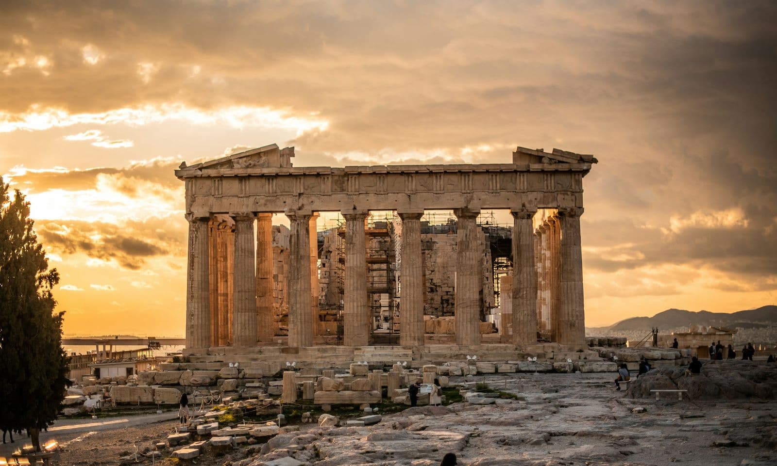 The Parthenon on the Acropolis of Athens, backlit by a setting sun